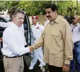  ?? LaPresse ?? Vicini di casa
Il presidente colombiano Juan Manuel Santos (a sinistra) con Nicolas Maduro nel 2016