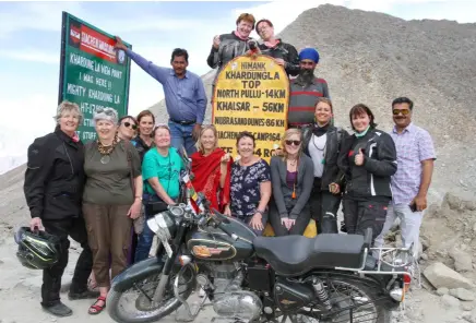  ??  ?? Above: After 12 days on the road, the all- female group of riders finally reached the top of the Himalayas.