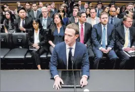  ?? Andrew Harnik ?? The Associated Press Facebook CEO Mark Zuckerberg prepares to testify before a House Energy and Commerce hearing Wednesday on Capitol Hill.
