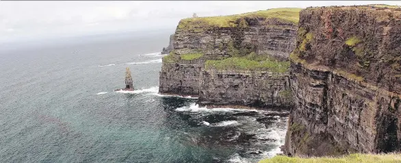  ?? KEN DONOHUE ?? At the dramatic Cliffs of Moher on the west coast, near 400-foot cliffs drop precipitou­sly to the Atlantic Ocean.