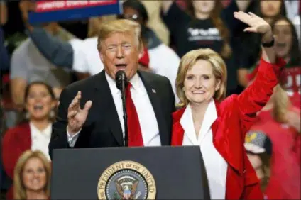  ?? ASSOCIATED PRESS ?? President Donald Trump encourages voters to support appointed Republican U.S. Sen. Cindy Hyde-Smith in a runoff race Tuesday against Democrat Mike Espy, as he speaks during a rally Monday, Nov. 26, 2018, in Biloxi, Miss.