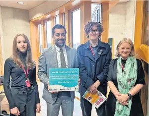  ?? ?? Opportunit­y Tom, second from right, was among those to meet Humza Yousaf