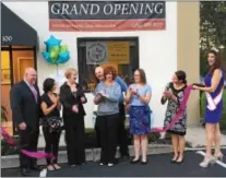  ??  ?? Above and below, supporters recently helped Tracie Ullman open her new SoulScapes Reiki Laser Skin Center near Downingtow­n.