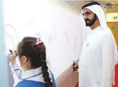  ?? Pictures: WAM ?? Shaikh Mohammad interacted with special needs children and reviewed the progress of their learning with officials at the Ministry of Community Developmen­t yesterday.