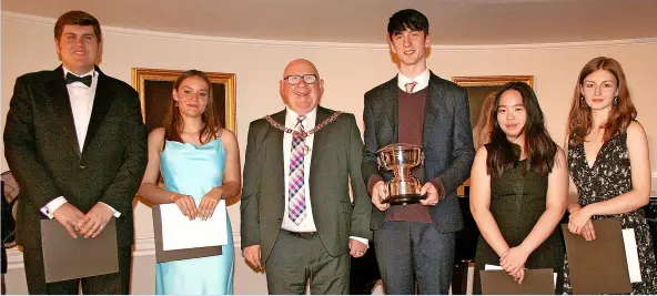  ?? ?? Mayor of Bath, Cllr Rob Appleyard with Bath Young Musician of the Year competitor­s Jack Harris, Evie Maya, Ruben Ridyard, Megan Ong and Amelia Wise