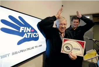  ?? MARTIN DE RUYTER/STUFF ?? Tasman Mako captain Quinten Strange, right, presents Murray Sturgeon with the first Tasman Rugby Union Finatics membership.