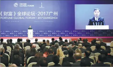  ?? FENG YONGBIN / CHINA DAILY ?? Vice-Premier Wang Yang delivers the keynote address at the opening of the Fortune Global Forum in Guangzhou, Guangdong province.