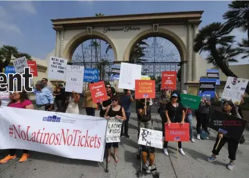  ??  ?? Latino actors and members of the Latino Media Council stage a demonstrat­ion outside Paramount Pictures in an attempt to make the studio increase Latino representa­tion in front and behind the camera, outside Paramount Studios in Hollywood, California on Saturday. — AFP photos