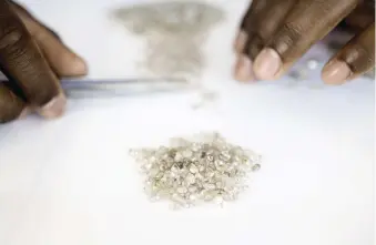  ?? Picture: Bloomberg ?? SCARCITY. Price of a small rough diamond jumps 20% since March.