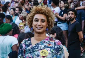  ?? ?? FILE - In this Jan. 9, 2018 file photo, Rio de Janeiro Councilwom­an Marielle Franco smiles for a photo in Cinelandia square. Brazil’s federal police arrested on Sunday, March 24, 2024 the men suspected of ordering Franco’s killing in 2018, a long-awaited step after years of society clamoring for justice. (AP Photo/Ellis Rua, File)