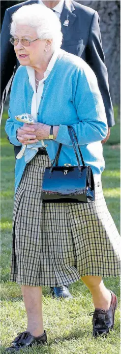  ?? Pictures: PETER MACDIARMID/LNP & OHN RAINFORD/WENN ?? Relaxation for the Queen yesterday at Windsor Horse Show