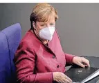  ?? FOTO: M. KAPPELER/DPA ?? Angela Merkel hat sich für strengere Regeln starkgemac­ht.
