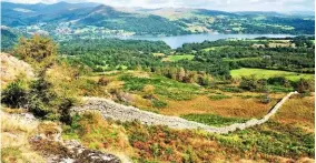  ?? ?? View east to Windermere and the Kentmere Fells from the top of Black Fell.