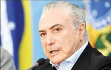  ?? EVARISTO SA/AFP ?? Brazilian President Michel Temer vowed on Sunday to block any attempt by legislator­s to grant themselves a corruption amnesty.