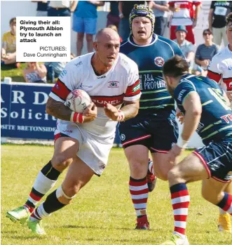  ?? PICTURES: Dave Cunningham ?? Giving their all: Plymouth Albion try to launch an attack