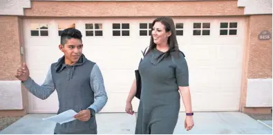  ?? DAVID WALLACE/THE REPUBLIC ?? Susan Woodruff talks to her adopted son, Jacob Woodruff, 17, as they leave Jacob's group home in Mesa to go to a basketball game.