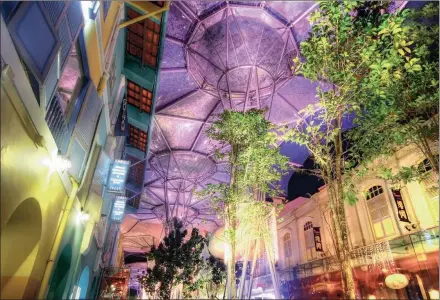  ?? PICTURE: WILLIAM CHO/WIKIMEDIA ?? LEFT: The lights of Clarke Quay. The area is alive with activity at night.