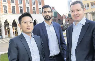  ??  ?? &gt;From left: James Mei and Sabial Hanif from Deloittle in Birmingham with Darren Boocock, head of the firm’s corporate finance division in the Midlands