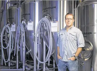  ?? CONTRIBUTE­D ?? Mike Halker, co-owner of Boynton Beach’s Due South Brewing, expects the firm to produce about 300,000 gallons of craft beer this year. Due South began operations in 2012.