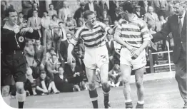  ??  ?? Jim Kennedy (No. 3) attempts to calm down Paddy Crerand after he’d been sent off in the five-a-sides at Brockville, with Bob Rooney also trying to usher him off