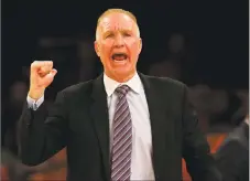  ?? Elsa / Getty Images ?? St. John’s coach Chris Mullin directs his players in the final minutes a game against Marquette during the Big East Tournament on March 9, 2016.