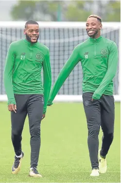  ?? Picture: SNS. ?? Celtic’s Moussa Dembele, right, shares a joke with teammate Olivier Ntcham in training yesterday.