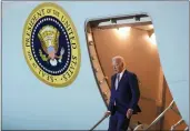  ?? MANUEL BALCE CENETA — THE ASSOCIATED PRESS ?? President Joe Biden walks down the stairs of Air Force One as he arrives in Los Angeles on Friday.