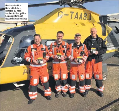  ??  ?? Hinckley Ambion Rotary Club has donated 30 head torches to Derbyshire, Leicesters­hire and Rutland Air Ambulance