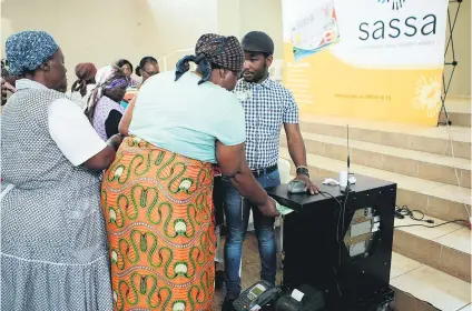  ?? Picture: Gallo Images ?? PAY DAY. Pensioners collect their grant money in March last year in Mpumalanga. The South African Social Security Agency has been in the spotlight for the ongoing grants debacle.