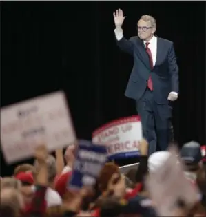  ?? TONY DEJAK — AP PHOTO ?? &gt;&gt; Mike DeWine, above, is the new governor for the state of Ohio. The Republican defeated Richard Cordray on Nov. 6. More on Page 2