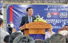  ?? PHOTO SUPPLIED ?? Acting opposition president Kem Sokha talks to supporters last month at the party’s headquarte­rs in Phnom Penh.