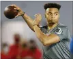  ?? ASSOCIATED PRESS FILE PHOTO ?? Ohio State quarterbac­k Justin Fields throws during an NFL Pro Day last month at Ohio State University in Columbus, Ohio.