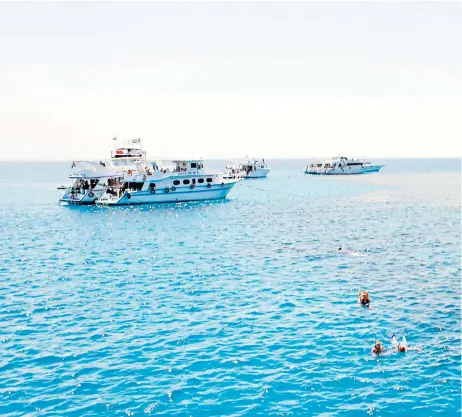  ?? ?? Dive time: immerse yourself in the balmy waters of Hurghada