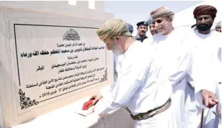  ?? — ONA ?? Sayyid Mohammed bin Sultan al Busaidy, Minister of State and Governor of Dhofar, laying the stone for the Al Bashayer Meat Company in the presence of Dr Fuad bin Jaafar al Sagwani, Minister of Agricultur­e and Fisheries, in Thamrait on Wednesday.
