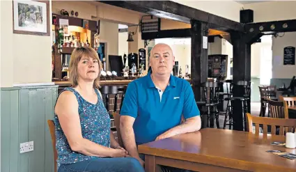  ??  ?? Sonia and Peter Freeman have been hit by the surcharge because they own a pub with a flat above it, meaning the only way they can get a refund is by selling their business