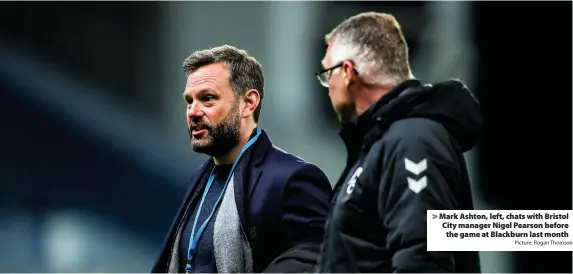  ?? Picture: Rogan Thomson ?? Mark Ashton, left, chats with Bristol City manager Nigel Pearson before the game at Blackburn last month