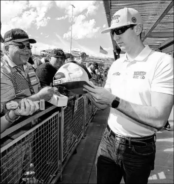  ?? Ralph Freso The Associated Press ?? NASCAR Cup Series driver and Las Vegas native Kyle Busch hopes to make his fans happy with a second season title by finishing at the front of the Championsh­ip 4 contenders on Sunday in the Ford EcoBoost 400 at Homestead-Miami Speedway.