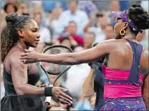  ?? ADAM HUNGER/AP PHOTO ?? Serena Williams, left, meets Venus Williams after their match during the third round of the U.S. Open on Friday in New York. Serena Williams won 6-1, 6-2, equalling her most lopsided victory over her sister.