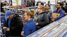  ?? TY GREENLEES / STAFF ?? Best Buy customers on Black Friday in Centervill­e. Retail in 2019 could look decidedly different on many fronts.