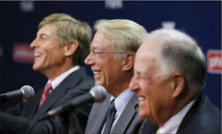  ?? THE ASSOCIATED PRESS FILE ?? It’s been nearly two years since ‘essential owner’ John Middleton, left, then-incoming president Andy MacPhail, center, and old-boss-turned-advisor Pat Gillick were yukking it up at a press conference introducin­g MacPhail. Two years of some of the...