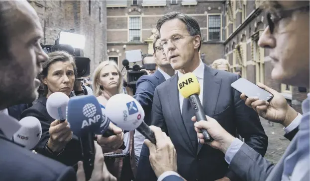  ?? PICTURE: BART MATT/GETTY ?? 0 Dutch Prime Minister Mark Rutte gives his support to investigat­ors of the attack, which claimed 298 lives, after yesterday’s announceme­nt