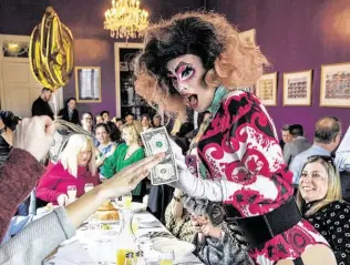  ?? Sally Asher ?? “We’ve kicked down doors with this book and taken the concept of drag queens and drag brunch into regular company,” says Poppy Tooker, author of “Drag Queen Brunch.”