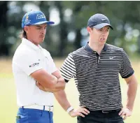  ??  ?? EASY GOING Ricky Fowler (left) and Rory Mcilroy yesterday