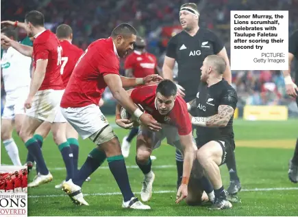  ?? PICTURE: Getty Images ?? Conor Murray, the Lions scrumhalf, celebrates with Taulupe Faletau after scoring their second try