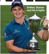  ??  ?? Smiles: Dunne and his trophy