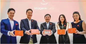  ?? AMIRUL SYAFIQ MOHD DIN/THESUN ?? At the launch ... Wong (centre) with (from far left) Imagene Labs ambassador Wong Yu Jin, Imagene Labs assistant director Dr. Lionel Lim, Imagene Labs general manager Jia Yi Har, and Imagene Lans product developmen­t director Alina Uchida.
(below) One...