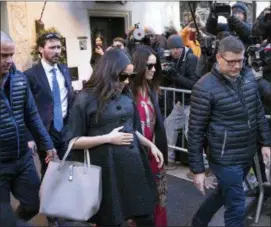  ?? KEVIN HAGEN — THE ASSOCIATED PRESS ?? Meghan, Duchess of Sussex, leaves the Surrey Hotel ahead of her baby shower at the Mark Hotel on Tuesday in New York.