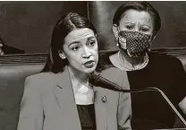  ??  ?? U.S. Rep. Alexandria Ocasio-Cortez, D-N.Y., said a male colleague in the House called her a slur in front of reporters.