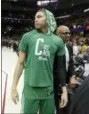  ?? TONY DEJAK — THE ASSOCIATED PRESS ?? Boston Celtics’ Jayson Tatum (0) walks off the court after the team’s 116-86 loss in Game 3 of the NBA basketball Eastern Conference finals against the Cleveland Cavaliers on Saturday in Cleveland.