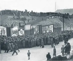  ??  ?? Crowds of football fans gather for a Dundee v Rangers game in 1949.